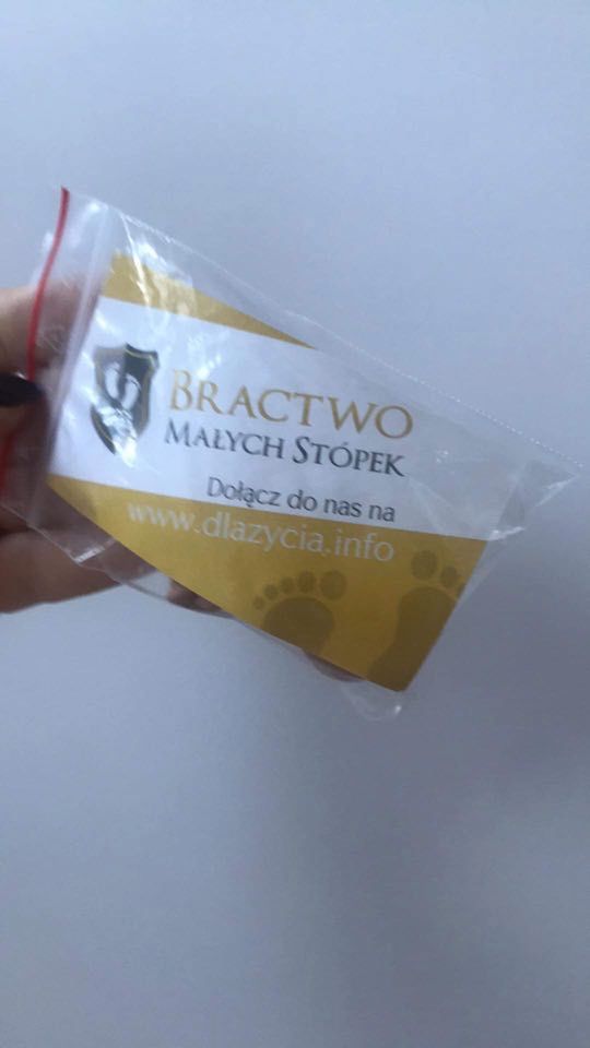 Wizytówka dołączona do figurki płodu 