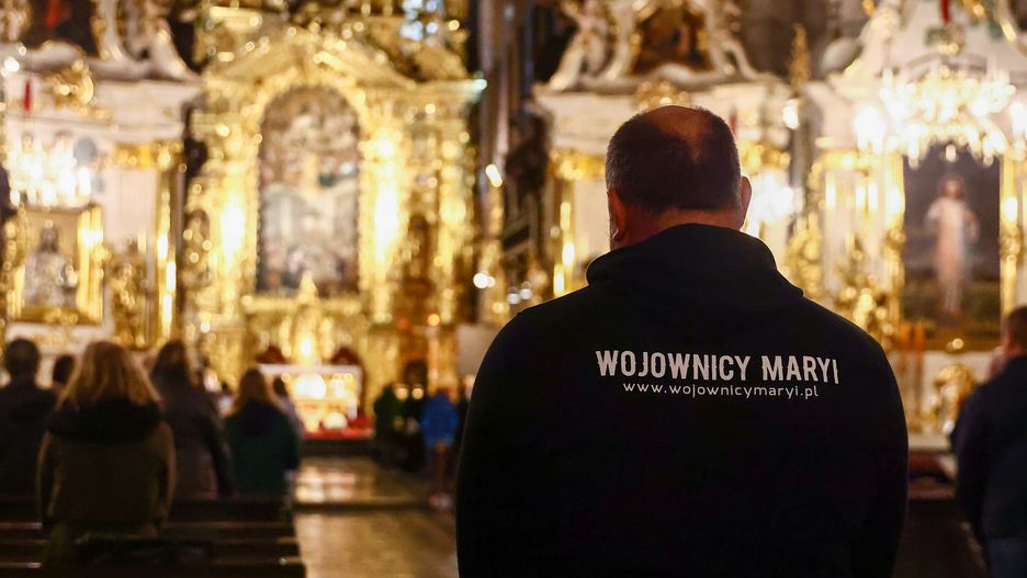 A member of 'Mary's Warriors' community attends the Propitious Eucharist for Halloween celebrated on the eve of All Saints' Day in Basilica of Corpus Christi in Krakow, Poland on October 31, 2023.  Since Halloween is gaining popularity in Poland, the parish is not favorable of celebrateing it and considers participation in these rituals to be a sin. 

 (Photo by Beata Zawrzel/NurPhoto via Getty Images)