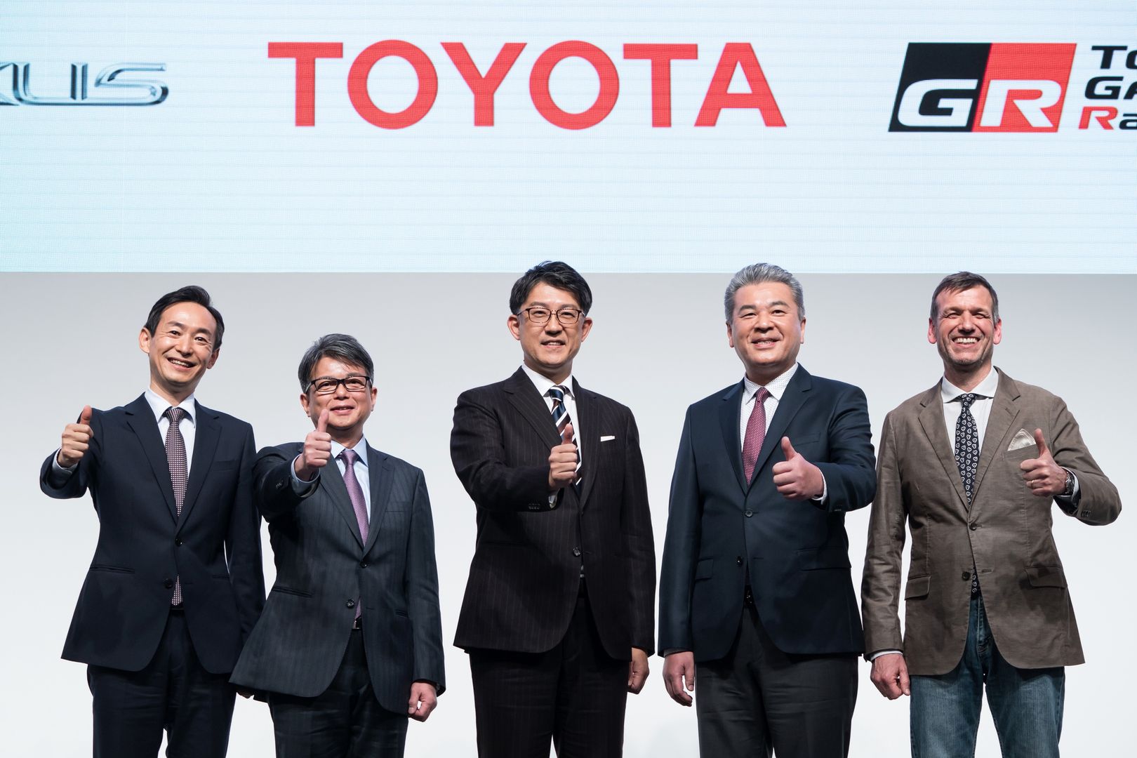 TOKYO, JAPAN - FEBRUARY 13: Toyota Motor Corp. incoming CEO Koji Sato (C) poses with the company's incoming operating officers including Chief Production Officer Kazuaki Shingo (L), Chief Financial Officer Yoichi Miyazaki (2-L), Chief Technology Officer Hiroki Nakajima (2-R) and Chief Branding Officer Simon Humphries (R) during a photo session following a press conference on February 13, 2023 in Tokyo, Japan. Sato is designated to be the next CEO in April as current CEO Akio Toyoda, grandson of the company's founder, to be in the position of chairman. (Photo by Tomohiro Ohsumi/Getty Images)