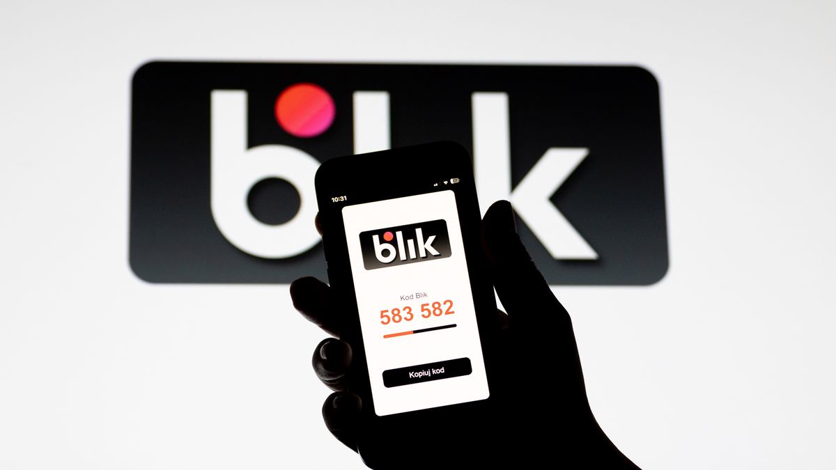 The BLIK logo and code are displayed on a mobile phone screen in Krakow, Poland, on May 8, 2026. BLIK is a major Polish mobile payment system that allows users to make instant transactions, withdraw cash, and transfer money using a unique six-digit code. (Photo by Marcin Golba/NurPhoto via Getty Images)