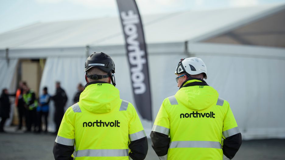LOHE-RICKELSHOF, GERMANY - MARCH 25: Two employees in bright yellow jackets are walking at the ground-breaking for the new Northvolt Gigafatctory electric car battery factory on March 25, 2024 in Lohe-Rickelshof, Germany. The factory, dubbed Northvolt Drei, will be powered by renewable energy and will eventually produce one million electric car batteries per year. (Photo by Gregor Fischer/Getty Images)
