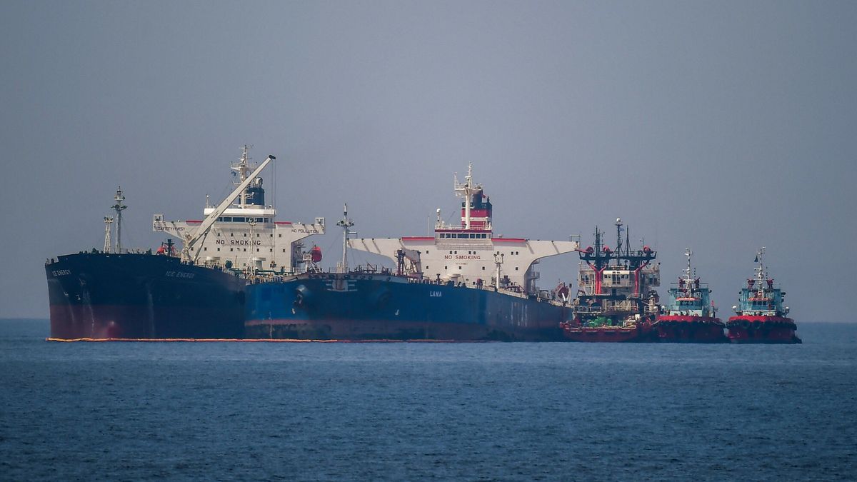 Temporary
The Liberian-flagged oil tanker Ice Energy (L) transfers crude oil from the Iranian-flagged oil tanker Lana (R) (former Pegas), off the shore of Karystos, on the Island of Evia, on May 29, 2022. - Greece will send Iranian oil from a seized Russian-flagged tanker to the United States at the request of the US judiciary, Greek port police said Wednesday, a decision that angered Tehran. Last month the Greek authorities seized the Pegas, which was said to have been heading to the Marmara terminal in Turkey. The authorities seized the ship in accordance with EU sanctions introduced after Russia invaded Ukraine in February. (Photo by Angelos Tzortzinis / AFP)
ANGELOS TZORTZINIS