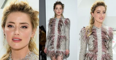 Opierzona Amber Heard bawi się w pierwszym rzędzie paryskiego pokazu
