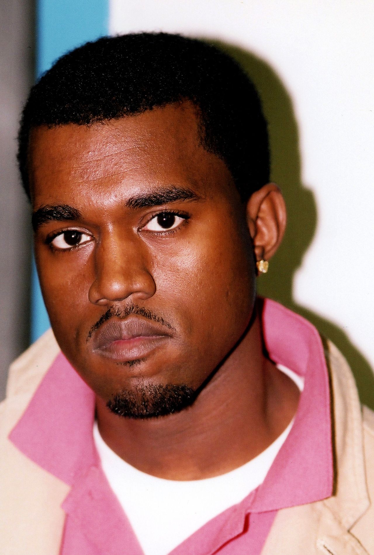 Rapper and producer Kanye West (Kanye Omari West) poses for photos during the 'Hoop Magic Charity Celebrity Basketball Game and Concert' at the Los Angeles Forum in Los Angeles, California in February 2004.  (Photo By Raymond Boyd/Getty Images)