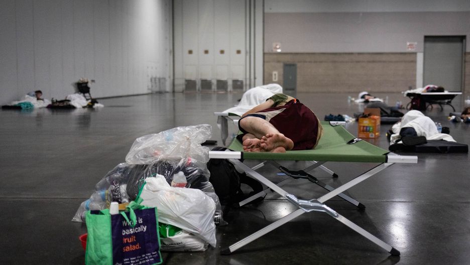Residents at a cooling center during a heatwave in Portland, Oregon, U.S., on Monday, June 28, 2021. Portland posted its hottest day in history on Saturday, and Sunday will be even warmer as a heat wave continues to bring oppressive temperatures across the normally mild Pacific Northwest. Photographer: Maranie Staab/Bloomberg via Getty Images