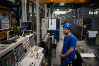 BERLIN, GERMANY - AUGUST 27: An employee works at the AWB Aluminiumwerk Berlin GmbH aluminum parts manufacturer, which employs Germans and foreign workers, some of whom are refugees, on August 27, 2024 in Berlin, Germany. Germany is facing an acute nationwide shortage of skilled labor. (Photo by Tamir Kalifa/Getty Images)
