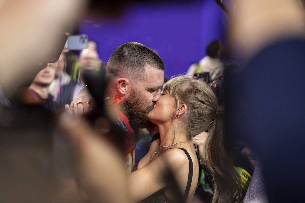 Heartbreak for all the GenZs as Taylor Swift kisses Travis Kelce after the SuperBowl win
