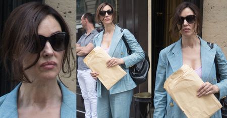 Zdołowana Monica Bellucci z kopertą A4