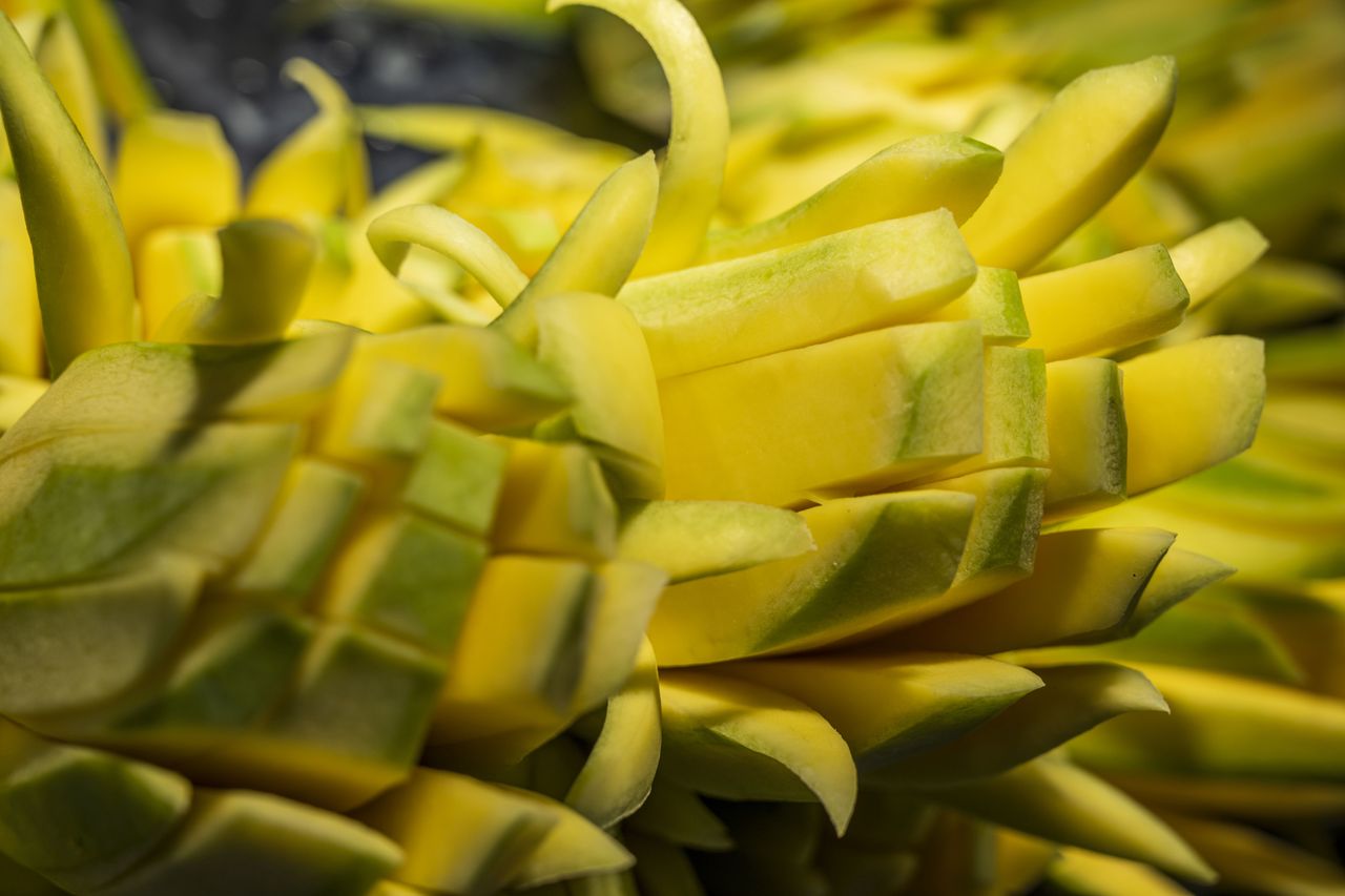 NANNING, CHINA - APRIL 13 2024: A stall serving mango slices with spice and salt in a market in Nanning in south China's Guangxi Zhuang Autonomous Region. (Photo credit should read HU YAN / Feature China/Future Publishing via Getty Images)