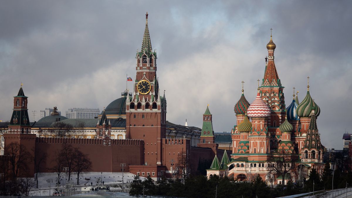 The Spasskaya tower of the Kremlin, center, and Saint Basil's Cathedral, right, in Moscow, Russia, on Tuesday, Feb. 22, 2022. The ruble tumbled the most since March 2020 after President Vladimir Putin recognized self-declared separatist republics in east Ukraine, deepening a standoff with the West. Photographer: Andrey Rudakov/Bloomberg via Getty Images