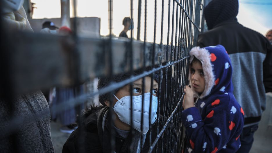 RAFAH, GAZA - NOVEMBER 24: Palestinians wait with their luggage to cross the border after Egypt exceptionally opened the Rafah border crossing with the Gaza Strip for three consecutive days in both directions, in Rafah, Gaza on November 24, 2020. (Photo by Ali Jadallah/Anadolu Agency via Getty Images)