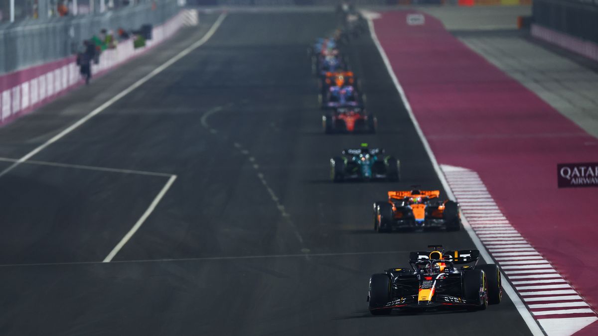 LUSAIL CITY, QATAR - OCTOBER 08: Max Verstappen of the Netherlands driving the (1) Oracle Red Bull Racing RB19 leads Oscar Piastri of Australia driving the (81) McLaren MCL60 Mercedes during the F1 Grand Prix of Qatar at Lusail International Circuit on October 08, 2023 in Lusail City, Qatar. (Photo by Mark Thompson/Getty Images)