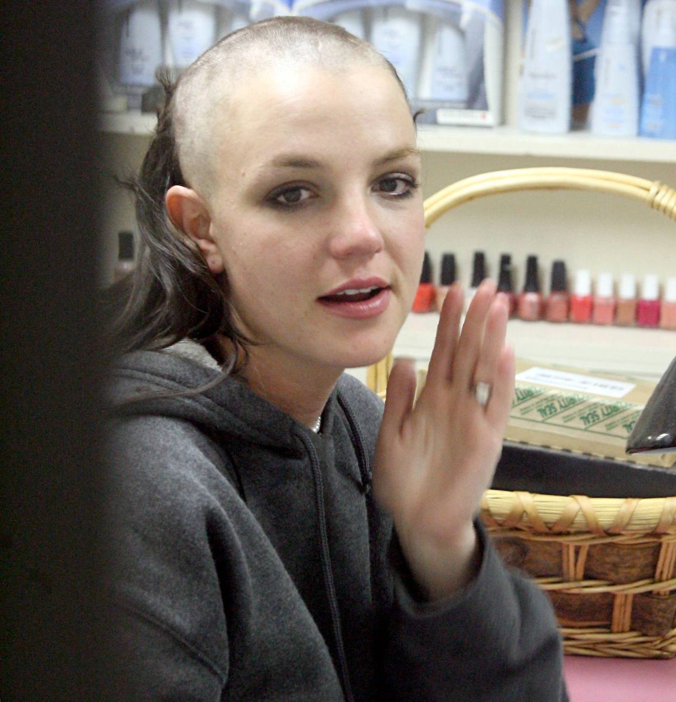 Britney shaves her headBritney Spears shaves her head and gets two tattoos Feb 16, 2007  EXCLUSIVE,Image: 20253295, License: Rights-managed, Restrictions: , Model Release: no, Credit line: MBF/X17online.com / X17 / ForumMBF/X17online.com / X17 / Forumcelebrity set, gossip, fashion police, half length, flub, contretemps, faux pas, grey sweater, grey jumper, grey pullover, brunette, dark-haired, long hair, bald, hairless