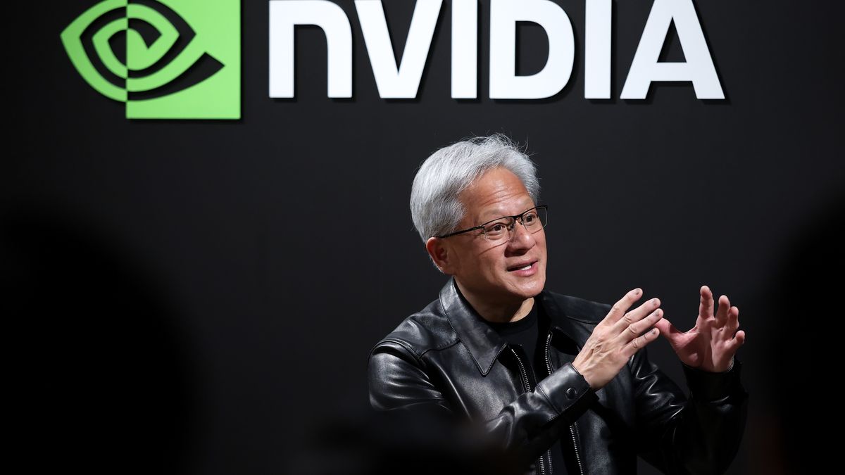Jensen Huang, chief executive officer of Nvidia Corp., speaks to members of the media following the company's "Japan AI Ecosystem" reception in Tokyo, Japan, on Thursday, July 16, 2026. Japan is planning to buy 27,500 next-generation Rubin chips from Nvidia Corp. to build a homegrown foundational AI model for robots. Photographer: Kiyoshi Ota/Bloomberg via Getty Images