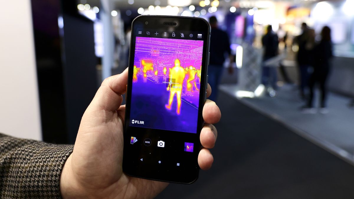 A Cat smartphone featuring a FLIR Lepton 3.5 Thermal Camera integrated that allows the user to see infrared images without any additional device being demonstrated at Mobile World Congress (MWC) the biggest trade show of the sector focused on mobile devices, 5G, IOT, AI and big data, celebrated in Barcelona, on March 3, 2022 in Barcelona, Spain.
 (Photo by Joan Cros/NurPhoto via Getty Images)