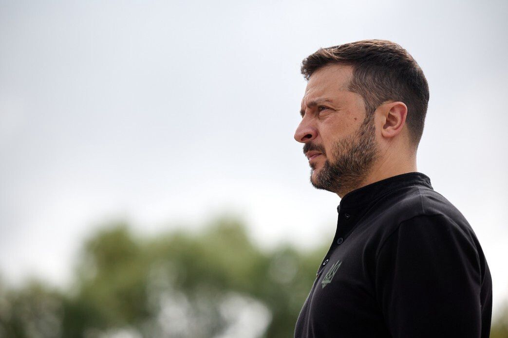 UKRAINE - AUGUST 4: (----EDITORIAL USE ONLY - MANDATORY CREDIT - UKRAINIAN PRESIDENCY / HANDOUT' - NO MARKETING NO ADVERTISING CAMPAIGNS - DISTRIBUTED AS A SERVICE TO CLIENTS----) President of Ukraine Volodymyr Zelensky delivers a speech on the stand in front of the first General Dynamics F-16 Fighting Falcon received by Ukraine, congratulating the Ukrainian military on August 4, 2024 in, Ukraine. The first General Dynamics F-16 Fighting Falcons received by Ukraine were demonstrated at the Ukrainian Air Force Day event attended by President of Ukraine Volodymyr Zelensky. (Photo by Ukrainian Presidency/Handout/Anadolu via Getty Images)