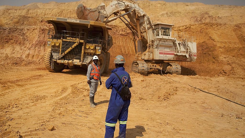 Gertler Earns Billions as Mine Deals Leave Congo
Workers stand near a Terex Corp. mining excavator as it loads ore into a Caterpillar Inc. truck during excavations at Katanga Mining Ltd.'s KOV copper and cobalt mine in Kolwezi, Katanga province, Democratic Republic of Congo, on Wednesday, Aug. 1, 2012. Israeli billionaire Dan Gertler, whose grandfather co-founded Israel's diamond exchange in 1947, arrived in Congo in 1997 seeking rough diamonds. Since those early days, Gertler has invested in iron ore, gold, cobalt and copper as well as agriculture, oil and banking. Photographer: Simon Dawson/Bloomberg via Getty Images
Bloomberg
BILLION; BILLIONAIRE, DIAMOND; DIAMONDS; GEM; GEMS, EMEA; EUROPE;, MOGUL; BUSINESSMAN, ORE; METAL; METALS; MINING