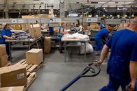 Operations At Poland's Biggest Clothes Retailer LPP SA
Employees prepare clothing items for distribution on the processing line in the logistics center of LPP SA in Pruszcz Gdanski, Poland, on Thursday, Aug. 13, 2015. LPP is central Europe's biggest publicly-traded clothing retailer. Photographer: Bartek Sadowski/Bloomberg via Getty Images
Bloomberg
EMEA; EUROPE, POLAND; POLISH; EUROPE, MODEL; FASHION; APPAREL, RETAIL; RETAILER; STORE; STORES, FINANCE; FINANCIAL; ECONOMY, ECONOMY; ECONOMIC; ECO, MANUFACTURER; FACTORY; INDUSTRY