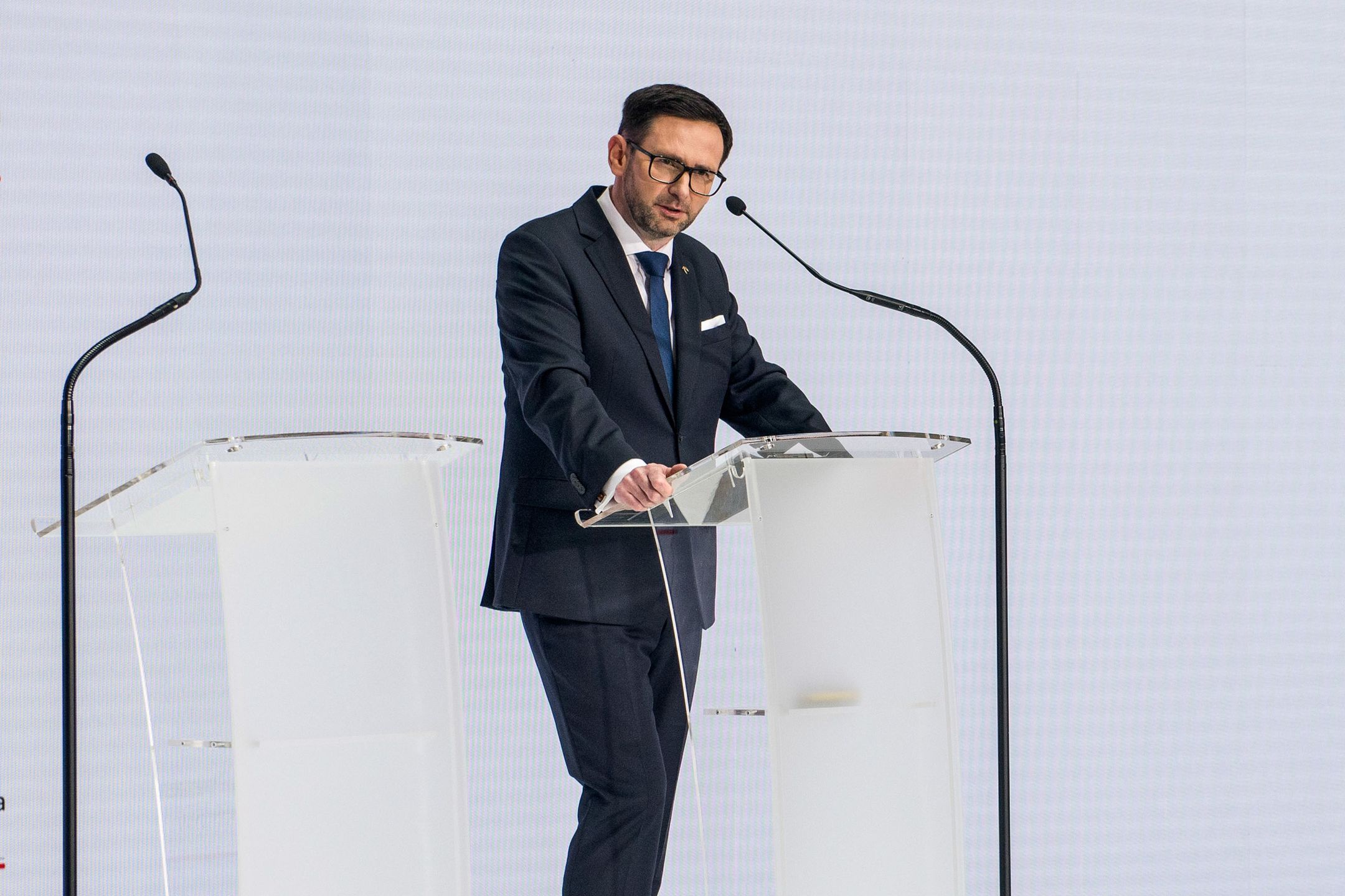 WARSAW, POLAND - 2023/04/17: Daniel Obajtek, the President and CEO of the Polish Oil Company ORLEN speaks during the press conference in Warsaw. Daniel Obajtek, the President and CEO of the Polish Oil Company ORLEN, announced the details of the planned investments in Small Modular Reactors (SMR) for Poland. For this purpose, the company Orlen Synthos Green Energy (OSGE) was established, supported by the Polish billionaire - Michal Solowow. OSGE will buy reactors from US-based GE Hitachi. (Photo by Attila Husejnow/SOPA Images/LightRocket via Getty Images)