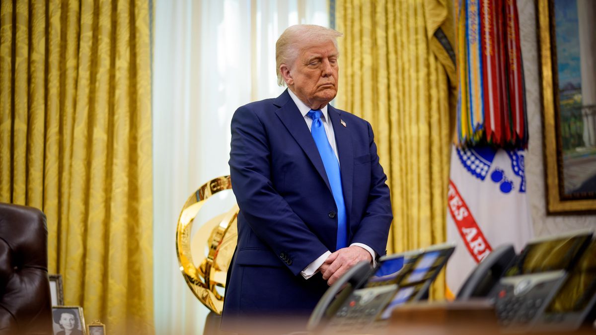 WASHINGTON, DC - MARCH 28: U.S. President Donald Trump stands for a prayer during a swearing-in ceremony in the Oval Office at the White House on March 28, 2025 in Washington, DC. Trump hosted the swearing in of his former personal attorney and White House Presidential counselor Alina Habba as interim U.S. Attorney in New Jersey. (Photo by Andrew Harnik/Getty Images)