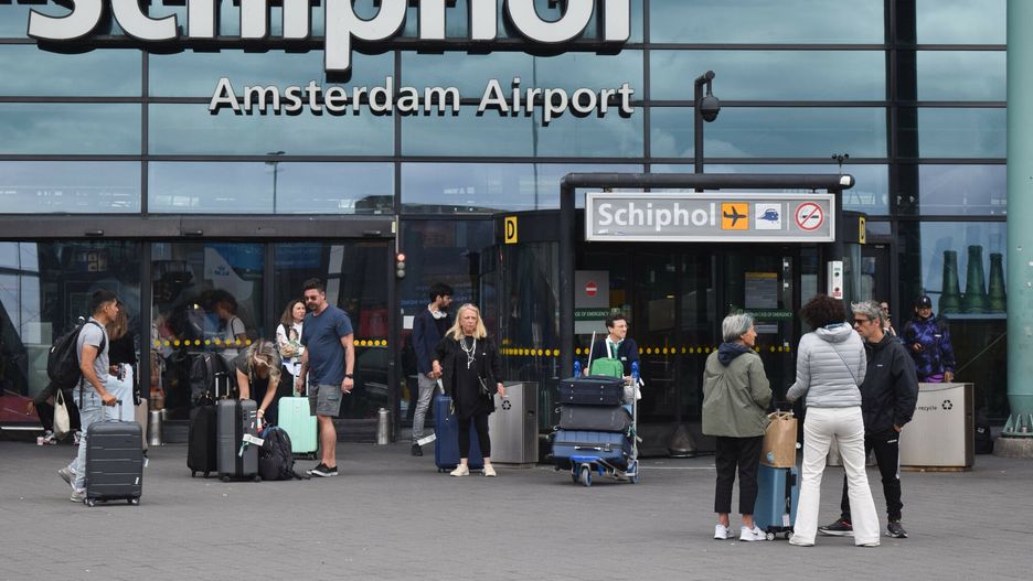 Temporary
AMSTERDAM, HOLLAND - JULY 22: People are seen in front of Schiphol airport in Amsterdam, Holland on July 22, 2023. Schiphol Airport expects a 26 percent increase in the number of passengers departing from the Amsterdam region during the upcoming summer vacation compared to 2022. The airport said it is preparing to serve an average of 68,000 passengers a day and expects over 77,000 on peak days. The busiest dates are expected to be July 8, when the central school district starts vacation, July 15, when the southern Netherlands starts vacation, and July 22, when those in the northern region start their summer vacation. Mouneb Taim / Anadolu Agency/ABACAPRESS.COM
AA/ABACA
