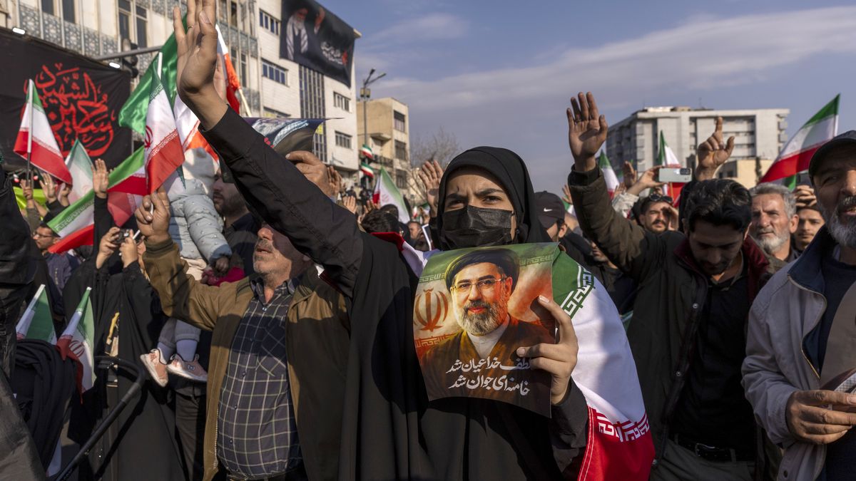 TEHRAN, IRAN - MARCH 9: A demonstrator holds a picture of Iran's new Supreme Leader Ayatollah Mojtaba Khamenei during a rally in support of the new Supreme Leader at Enghelab Square on March 9, 2026 in Tehran, Iran. The United States and Israel continued their joint attack on Iran that began on February 28. Iran retaliated by firing waves of missiles and drones at Israel, and targeting U.S. allies in the region. (Photo by Majid Saeedi/Getty Images)