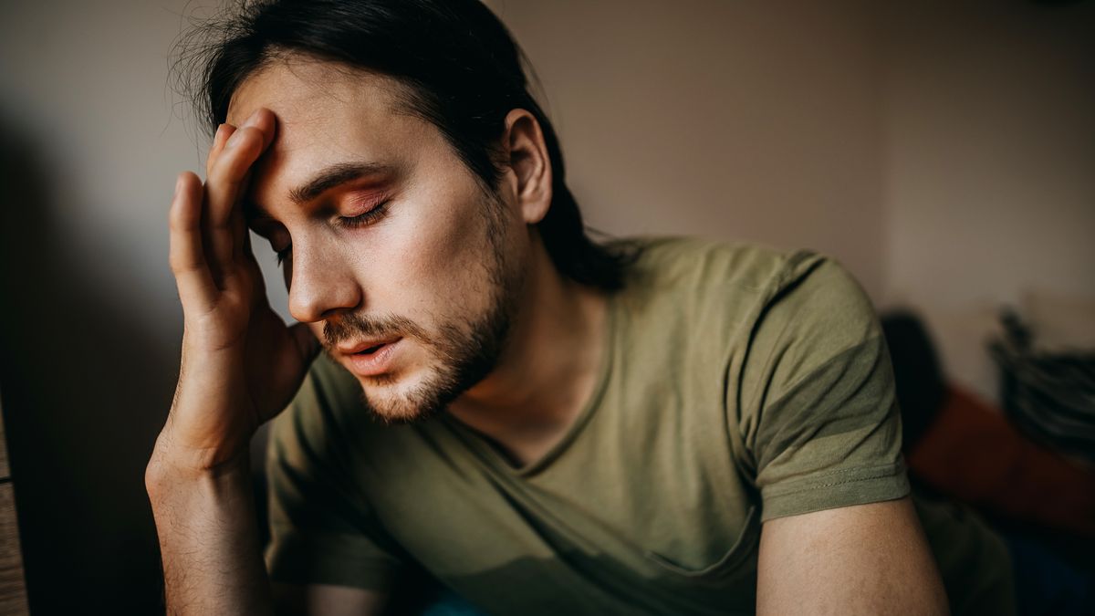 Depressed man
Depressed men sitting alone in living room
StefaNikolic