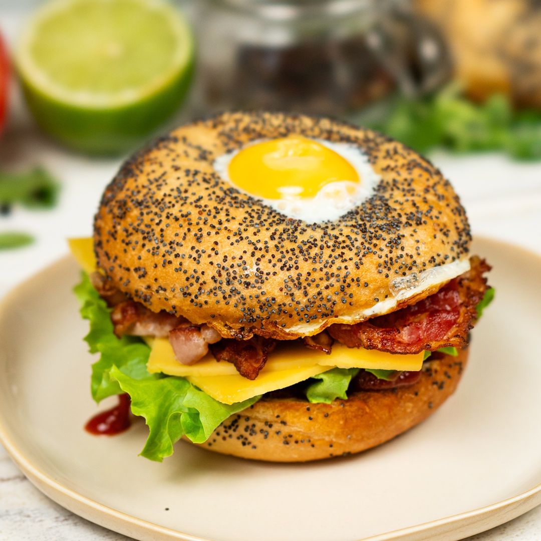 Bagel with bacon, cheese, and egg