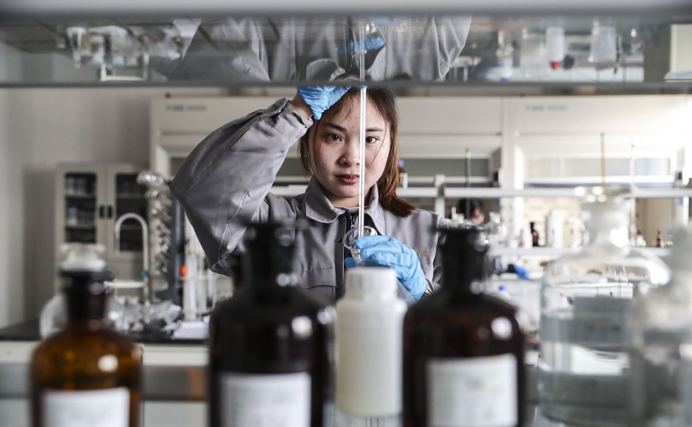 HUAI'AN, CHINA - APRIL 6, 2021 - A worker performs a laboratory inspection at a chemical plant in Huai 'an, east China's Jiangsu province, April 6, 2021. (Photo credit should read Costfoto/Barcroft Media via Getty Images)