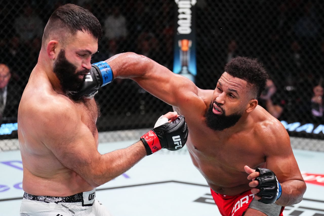 LAS VEGAS, NEVADA - JANUARY 13: (R-L) Waldo Cortes-Acosta of the Dominican Republic punches Andrei Arlovski of Belarus in a heavyweight fight during the UFC Fight Night event at UFC APEX on January 13, 2024 in Las Vegas, Nevada. (Photo by Chris Unger/Zuffa LLC via Getty Images)