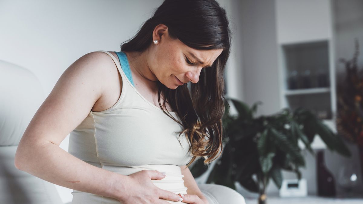 Having problems during pregnancy
Caucasian pregnant woman suffering during her pregnancy, with back pain and headaches. Pregnant woman sitting on the sofa holding her belly with worried face expression.
Ziga Plahutar