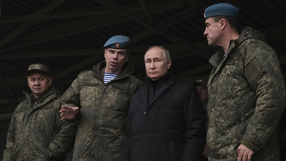 Temporary
In this handout photo released by Russian Defense Ministry Press Service, Russian President Vladimir Putin, second right, Russian Defense Minister Sergei Shoigu, left, and Deputy Commander of the Airborne Troops Anatoly Kontsevoy, second left, visit a military training centre of the Western Military District for mobilised reservists in Ryazan Region, Russia, Thursday, Oct. 20, 2022. (Russian Defense Ministry Press Service via AP)