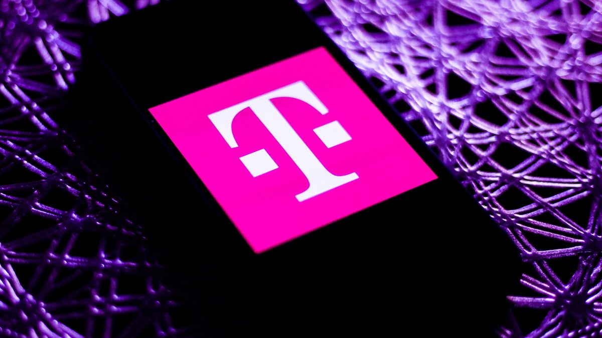 T-Mobile logo is seen displayed on a phone screen in this illustration photo taken in Poland on November 19, 2020. (Photo by Jakub Porzycki/NurPhoto via Getty Images)