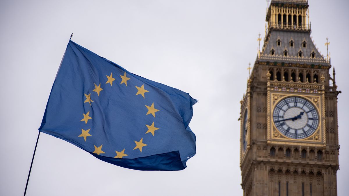 LONDON, UNITED KINGDOM - 2023/12/13: The EU flag is seen flying by Big Ben during a demonstration in London. Pro-EU activists gathered for their weekly Wednesday protest outside the Palace of Westminster in London. They are demonstrating against what they perceive as inhumane treatment of immigrants under the Tory Government's policies. The protesters are calling for a general election and advocating for the UK to rejoin the EU. (Photo by Krisztian Elek/SOPA Images/LightRocket via Getty Images)
