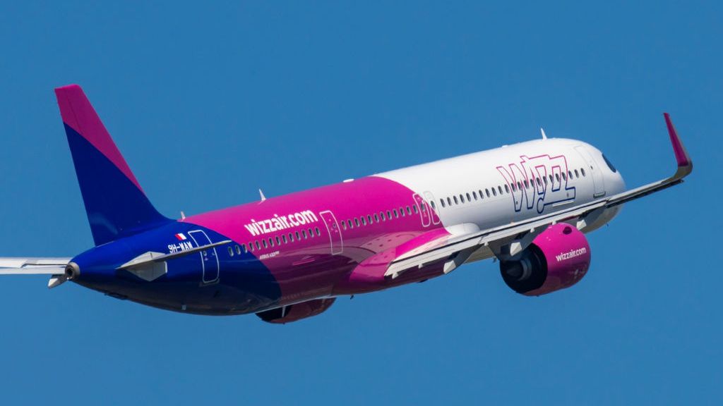 WizzAir Airbus A321neo Departing From Eindhoven Airport
Wizz Air Malta Airbus A321 neo aircraft spotted at Eindhoven Airport during taxiing, taking off and flying phase in the blue sky. The A321NEO passenger jet airplane with registration tail number 9H-WAW of the budget airline departs for a flight to Katowice KTW International Airport in Poland. Wizz Air Holdings is a Hungarian ultra low cost carrier group with a fleet of 215 Airbus planes. Wizz Air Malta is a Maltese low-cost airline and a subsidiary of the Hungarian ultra low-cost carrier Wizz Air. Eindhoven, the Netherlands on August 12, 2024 (Photo by Nicolas Economou/NurPhoto via Getty Images)
NurPhoto
budget airline, livery, plane, wings, a321 neo, jetliner, ultra low cost, air travel, airbus a321neo, eu, take off, blue sky, fly, hungarian, maltese, aviation, taking off, aircraft, depart, low cost carrier, wizz air malta, flight, editorial