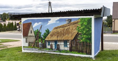 Portal Czasu w Starej Łubiance - nowy mural przenosi mieszkańców 100 lat wstecz