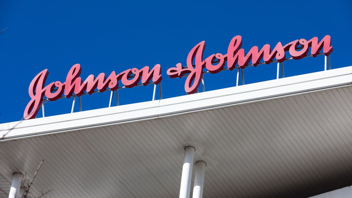 MADRID, SPAIN – NOVEMBER 19: A sign for Johnson & Johnson is seen outside the Johnson & Johnson headquarters on November 19, 2020 in Madrid, Spain. The Spanish Agency for Medicines and Health Products (AEMPS) has authorized the first phase 3 clinical trial on November 18, 2020 for the COVID-19 vaccine from the company Janssen, belonging to the American multinational Johnson & Johnson. Trials of this vaccine had to be stopped due to "unexplained illness" in one participant. The tests were resumed eleven days later, after verifying that the event was not related to the administration of the drug. (Photo by David Benito/Getty Images)