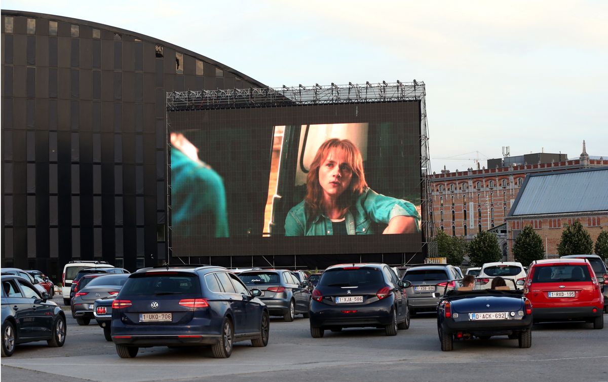 BRUSSELS, BELGIUM - JULY 03: People watch a movie from their cars at an open air cinema event, held within the novel coronavirus (COVID-19) measures, in Brussels, Belgium on July 03, 2020. (Photo by Dursun Aydemir/Anadolu Agency via Getty Images)