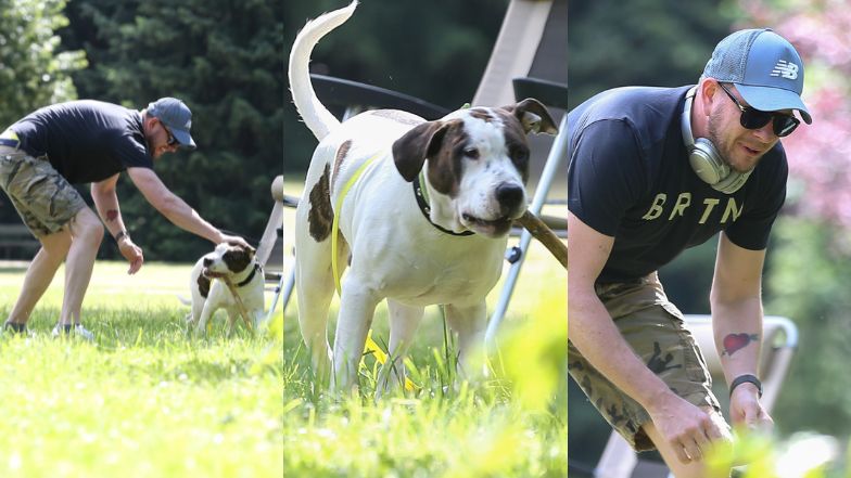Filip Chajzer relaksuje się w parku