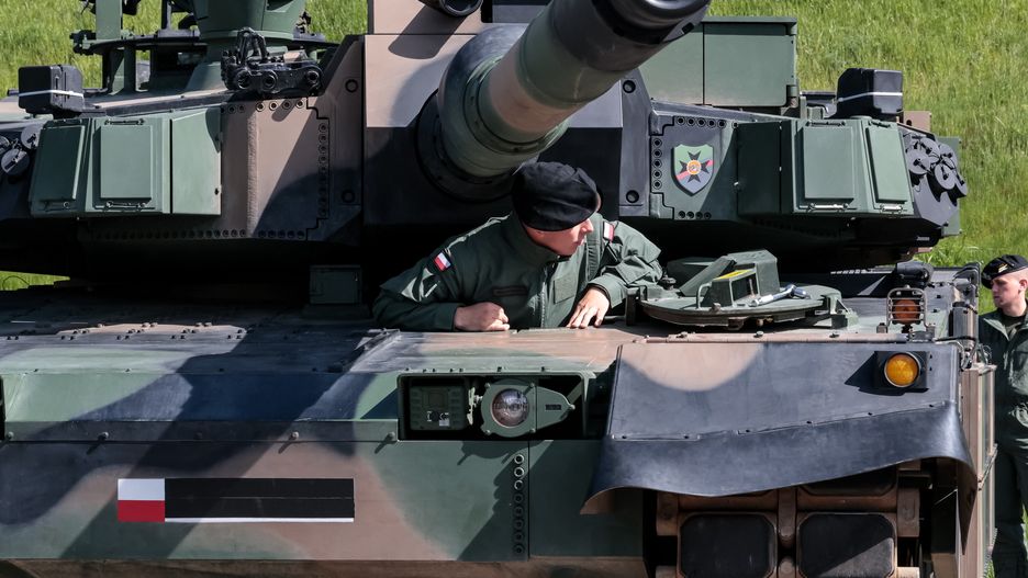 A soldier enters K2 GF tank during the 7th Defence24Days,
WARSAW, MAZOWIECKIE, POLAND - 2025/05/07: A soldier enters K2 GF tank during the 7th Defence24Days, defence industry exhibition in PGE Narodowy in Warsaw, the capital of Poland. The Exhibition presents most modern solutions and technologies in military industry. Minister of Defence Wladysaw Kosiniak Kamysz announced Poland aims to spend 4.7 percent of Polish Gross Domestic Product (GDP) in 2025 on military defence. (Photo by Dominika Zarzycka/SOPA Images/LightRocket via Getty Images)
SOPA Images
7th, defence industry, soldier, expo, k2 gf tank, defence24days, pge narodowy, defence24
