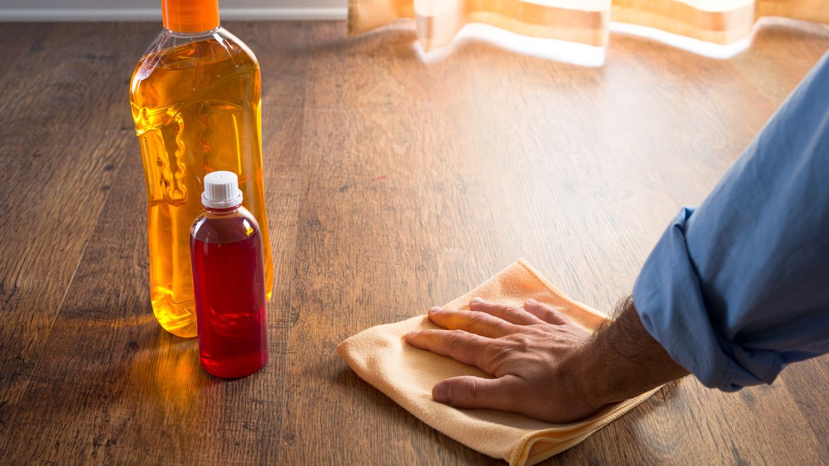Male hand applying wood care products on hardwood floor surface with a microfiber cloth.
Applying, Chemical, Chores, Cleaning, Cleansing, Cloth, Curtains, Detergent, Disinfectant, Disinfecting, Dusting, Finishing, Floor, Flooring, Hand, Hardwood, Hardwood floor, House, Housekeeping, Housework, Hygiene, Indoors, Maintenance, Microfiber, Oil, Parquet, Plank, Polish, Products, Rinsing, Room, Rubbing, Shiny, Stains, Washing, Waxing, Window, Wiping, Wood, Wooden, Wooden plank