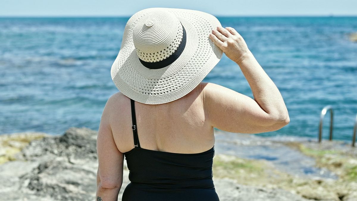 Middle age grey-haired woman tourist wearing swimsuit and summer hat standing backwards at the beachMiddle age grey-haired woman tourist wearing swimsuit and summer hat standing backwards at the beachmiddle age, woman, adult, elderly, mature, person, beautiful, senior, grey-haired, short hair, lifestyle, expression, standing, sunlight, sunny, fashion, casual, summer, swimsuit, swimwear, body, travel, vacation, holidays, tourist, tourism, sexy, hat, back, backwards, back view, sea, seaside, outdoor, outdoors, exterior, nature, ocean, beach, promenade, water, middle age, woman, adult, elderly, mature, person, beautiful, senior, grey-haired, short hair, lifestyle, expression, standing, sunlight, sunny, fashion, casual, summer, swimsuit, swimwear, body, travel, vacation, holidays, tourist, tourism, sexy, hat, back, backwards, back view, sea, seaside, outdoor, outdoors, exterior, nature, ocean, beach, promenade, water
