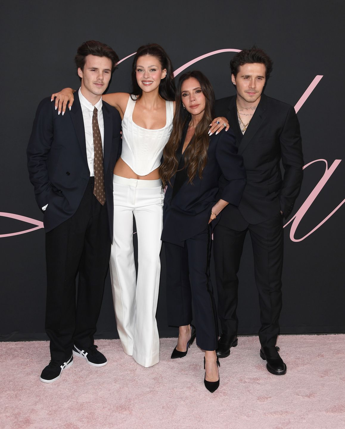 Romeo Beckham, Nicola Peltz Beckham Victoria Beckham and Brooklyn Beckham February 03, 2024 