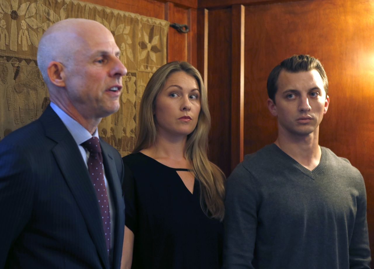 Denise Huskins and Aaron Quinn appear at a news conference with attorney Doug Rappaport (left) in San Francisco, Calif. on Thursday, Sept. 29, 2016. Huskins and Quinn were victims in the bizarre Vallejo kidnapping case in March 2015. Matthew Muller has pleaded guilty to kidnapping the couple. (Photo By Paul Chinn/The San Francisco Chronicle via Getty Images)