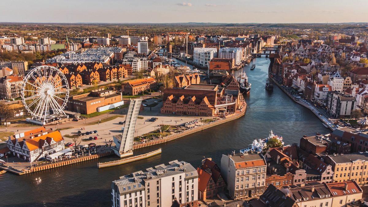 poland, tower, architecture, city, travel, gdansk, summer, panorama, old, sky, town, building, cityscape, tourism, history, outdoors, church, europe, horizontal, photography, polish, travel destination, sightseeing, landscape, river, street, horizon, skyline, roof, urban, house, sunset, landmark, orange color, gothic, rooftop, sunbeam, crane, aerial, promenade, port, townscape, touristic, european, scenic, medieval, harbor, visit, district