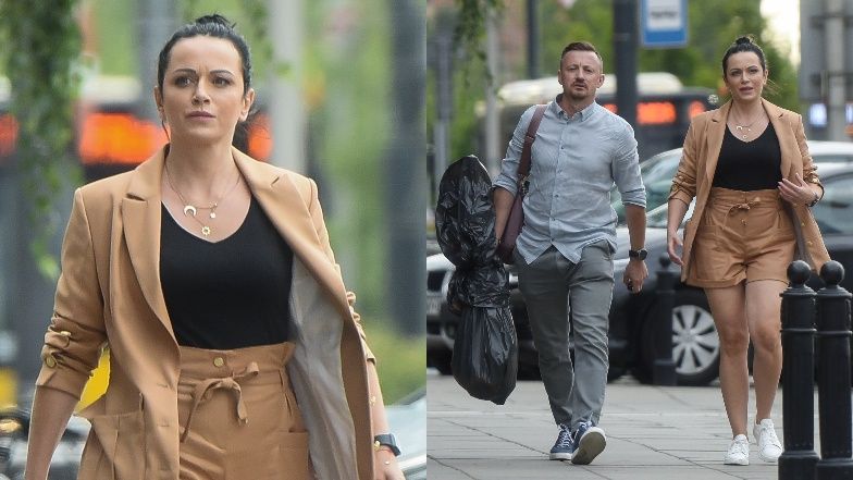 Izabela Małysz w towarzystwie męża Adama idzie do samochodu po treningu do "Tańca z gwiazdami"