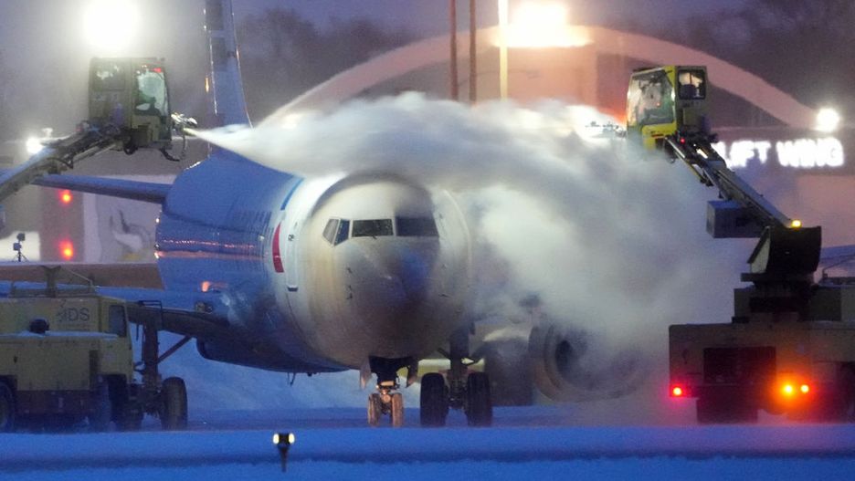 Winter storm, Minneapolis, December 2022
An American Airlines plane is de-iced as high winds whip around 7.5 inches of new snow at Minneapolis-St. Paul International Airport  Thursday, December 22, 2022. The Twin Cities saw 8 inches of snow Wednesday followed by wind gusts up to 50 mph and wind chills reaching -35 degrees F on Thursday and Friday. (Photo by David Joles/Star Tribune via Getty Images)
Star Tribune via Getty Images