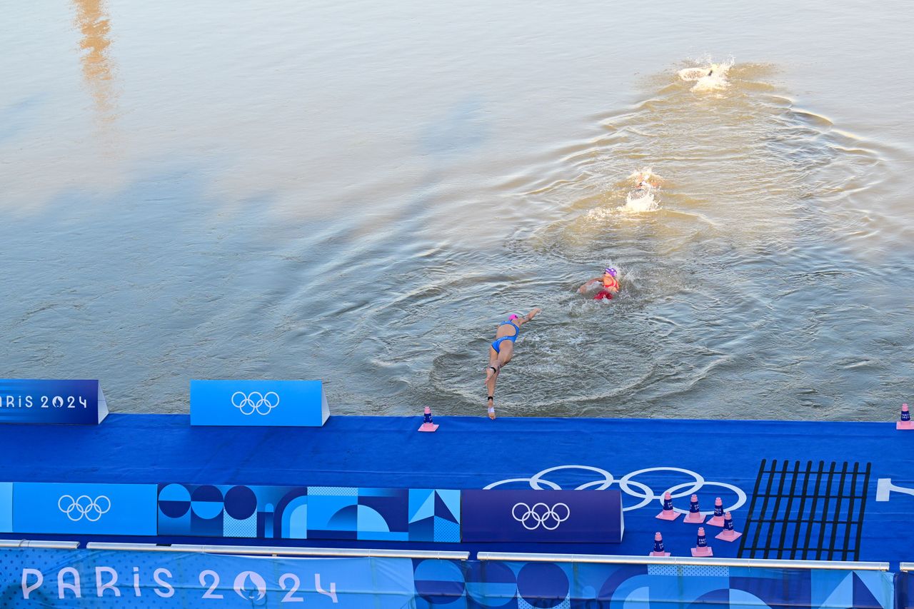 Paris Olympics halt marathon swim in Seine over water quality concerns