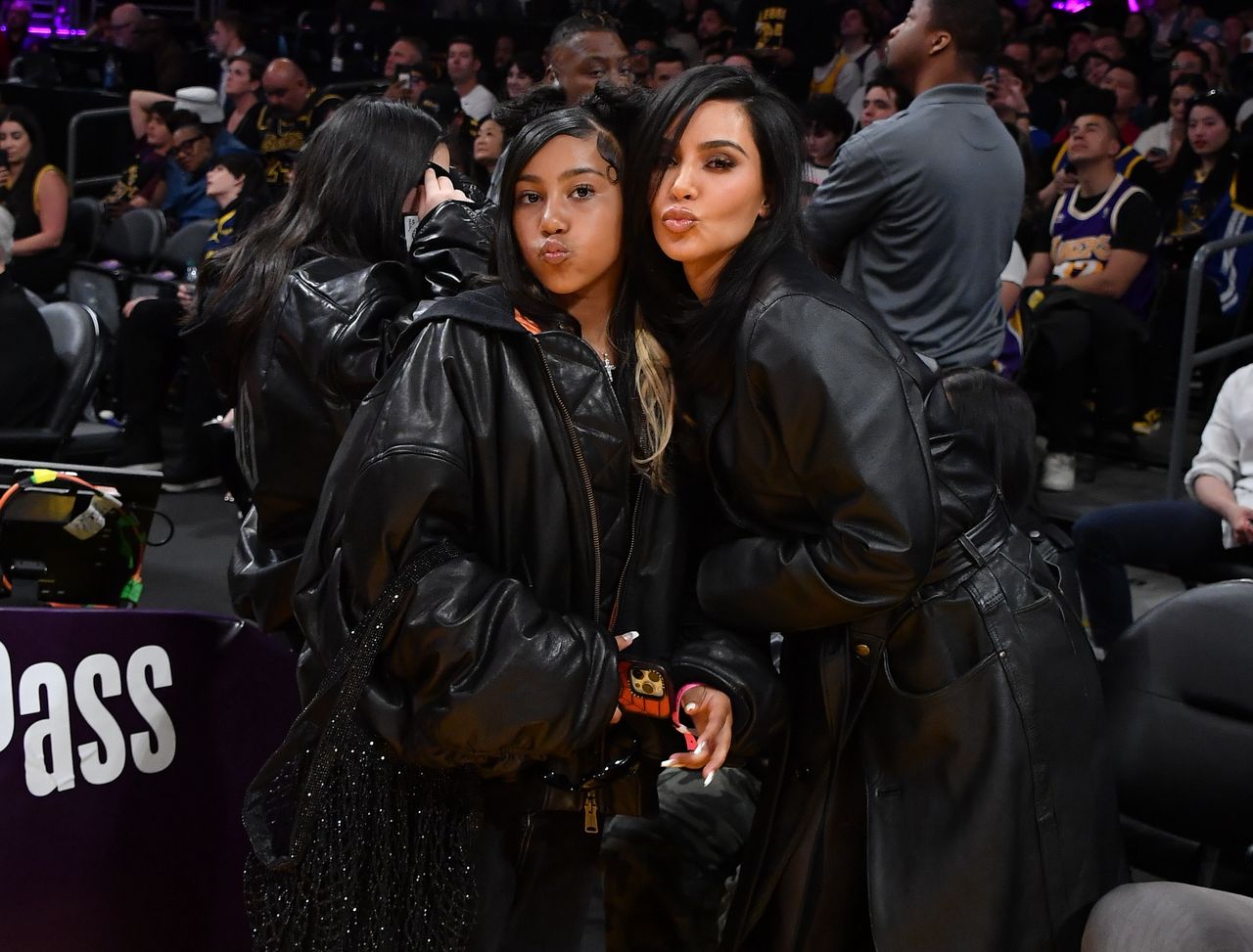 LOS ANGELES, CALIFORNIA - APRIL 09: Kim Kardashian (R) and North West attend a basketball game between the Los Angeles Lakers and the Golden State Warriors at Crypto.com Arena on April 09, 2024 in Los Angeles, California. NOTE TO USER: User expressly acknowledges and agrees that, by downloading and or using this photograph, User is consenting to the terms and conditions of the Getty Images License Agreement. (Photo by Allen Berezovsky/Getty Images)