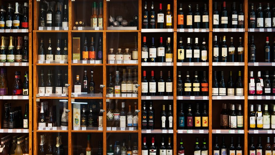 Large Cabinet With Many Bottles Of Wine At Supermarket
A large wooden cabinet filled with many different kinds of bottles of wine at a supermarket.
TommL
